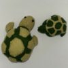 schildpadjes familie als deco of speldenkussentjes