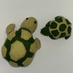 schildpadjes familie als deco of speldenkussentjes