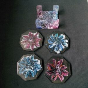 Uniek set onderzetters in houder.