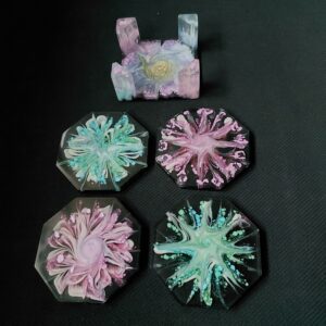 Uniek set onderzetters in houder.