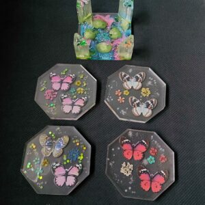 Uniek set onderzetters in houder.