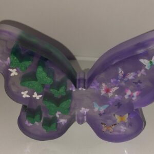 Mooie vlinder met kunst vlindertjes en met groen opgevulde vlinders.