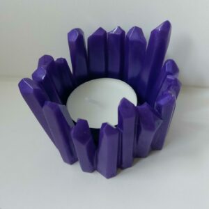 Waxinelichthouder in bijzondere vorm.