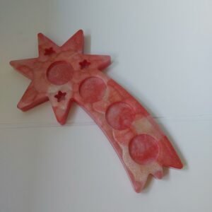 Feestelijke waxinelichtjes houder in ster vorm.