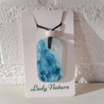 versmolten glazen hanger met aqua blauw zeegezicht
